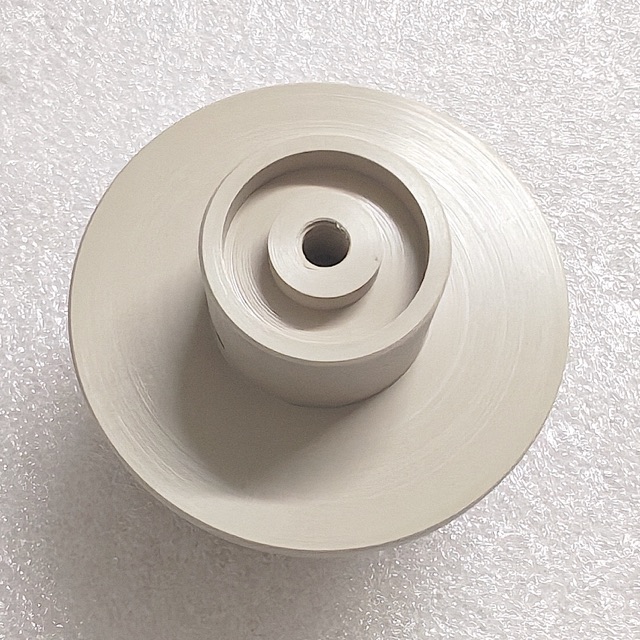 Custom PEEK precision component manufactured by Maisi Precision.