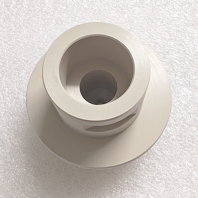 Custom PEEK precision component manufactured by Maisi Precision.