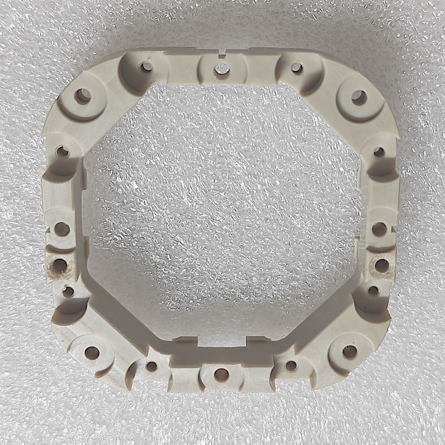 Custom PEEK precision component manufactured by Maisi Precision.