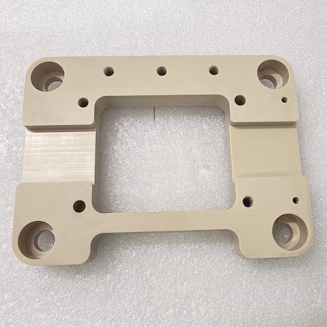 Custom PEEK precision component manufactured by Maisi Precision.